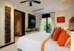 Bedroom n. 3 with air conditioning, fans, and TV